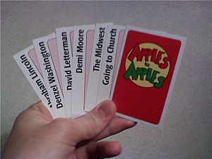 Seven red cards with one backwards showing the...