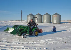 Christmas Traditions on the Farm V: Daddy Hooks Up the Sled to the Tractor