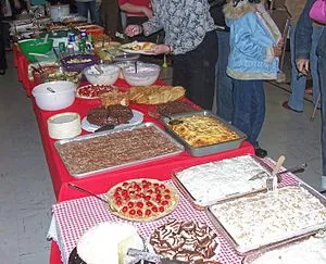 An assortment of food dishes at a church potluck. An assortment of food dishes at a church potluck.