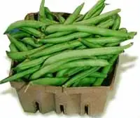 Whole green beans in a carton. Whole green beans in a carton.