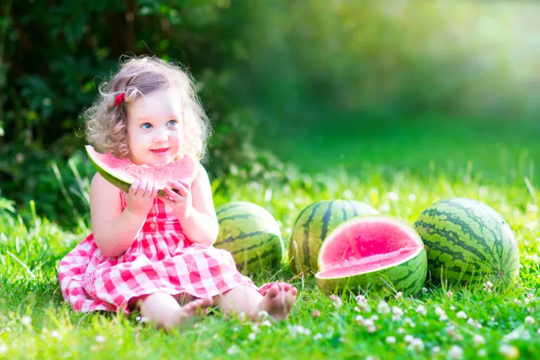 Little Girl Eating Watermelon