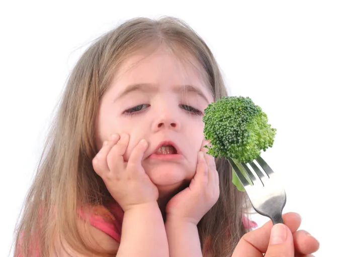 Girl And Healthy Broccoli Diet On White