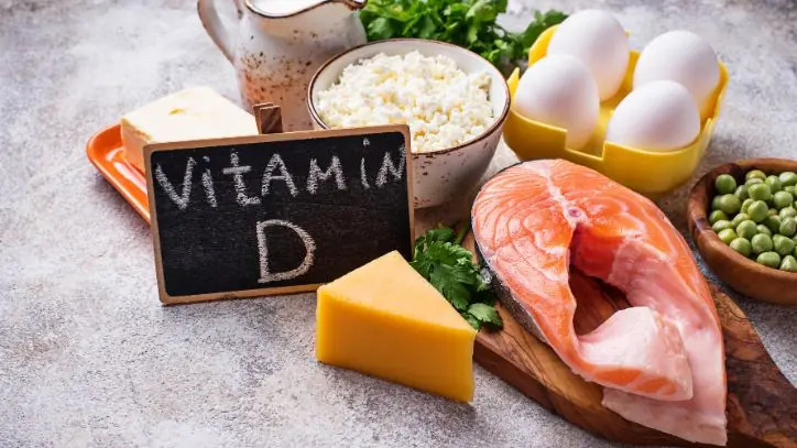 Spread including fish, cheese, eggs and a small chalkboard with "Vitamin D" written on it