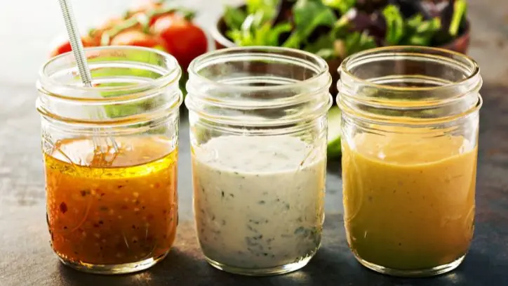 3 jars of homemade salad dressing