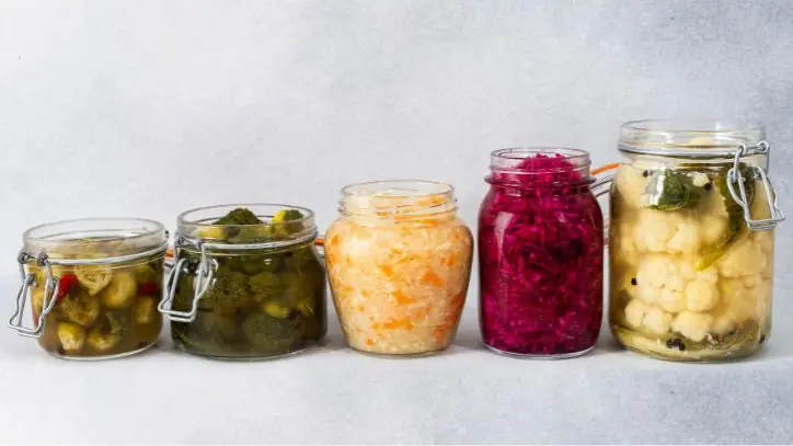 Jars filled with different types of fermented foods