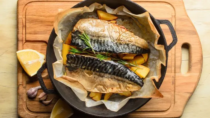 Cooked fish in a cast iron pan