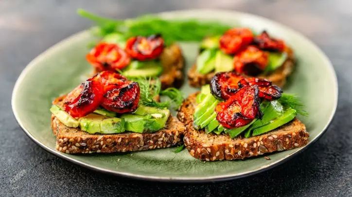 Avocados and tomatoes on toast