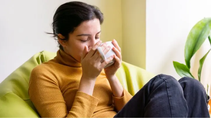 Woman drinking spearmint tea