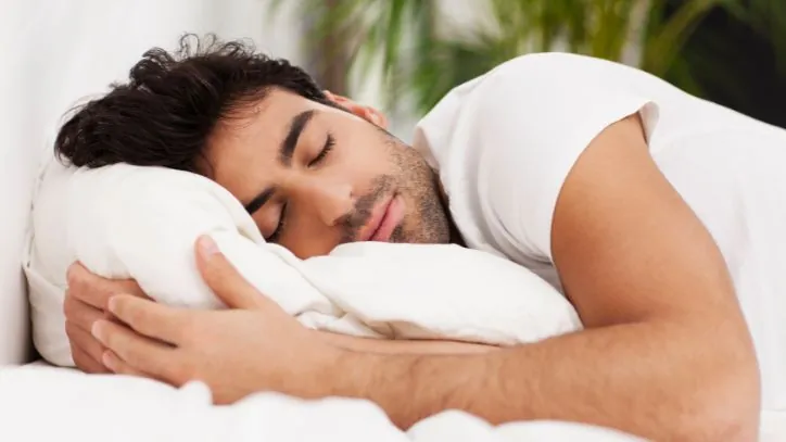 Man sleeping in bed
