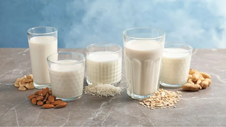 types of milk in multiple glasses