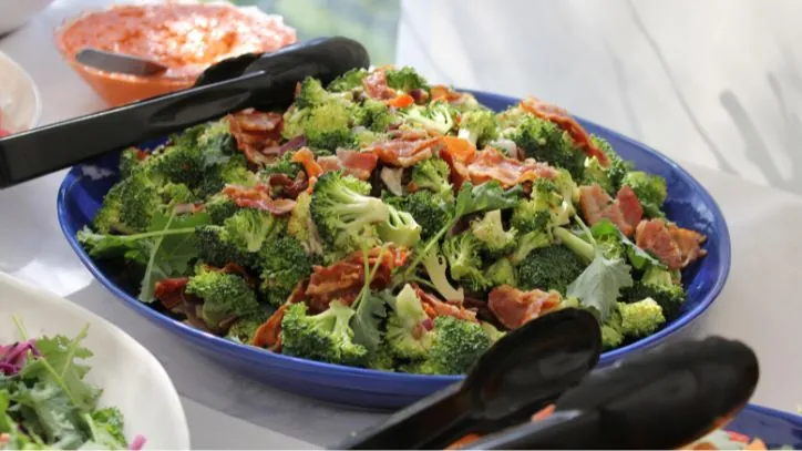 Winter Broccoli Bacon salad in a blue bowl