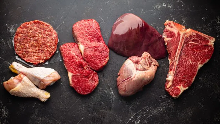 Multiple cuts of meat laid out in a line